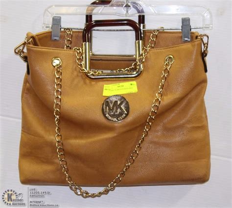 replica michael kors handbags manufacturers|michael kors older styles handbags.